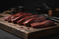 Raw Beef Liver on Cutting Board